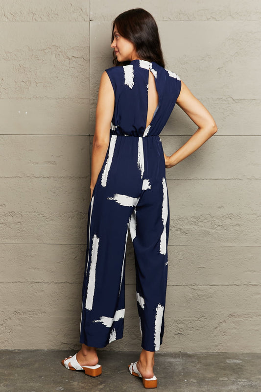 Elegant Perfee Printed Round Neck Cutout Jumpsuit with Pockets - adritiX