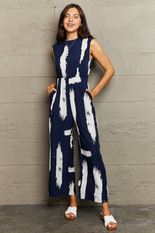 Elegant Perfee Printed Round Neck Cutout Jumpsuit with Pockets - adritiX
